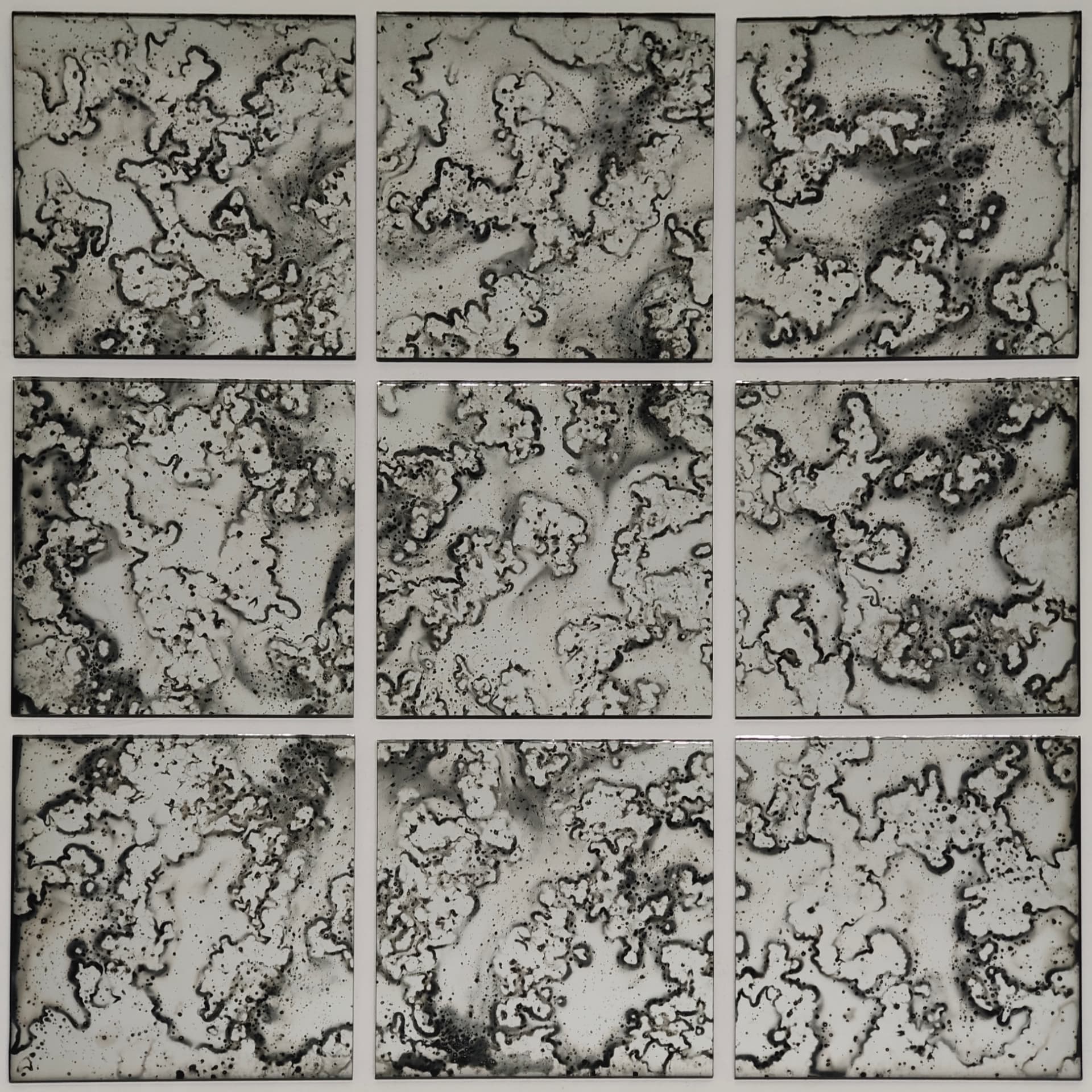 Atlas mirror shown as a nine-panel tiled arrangement