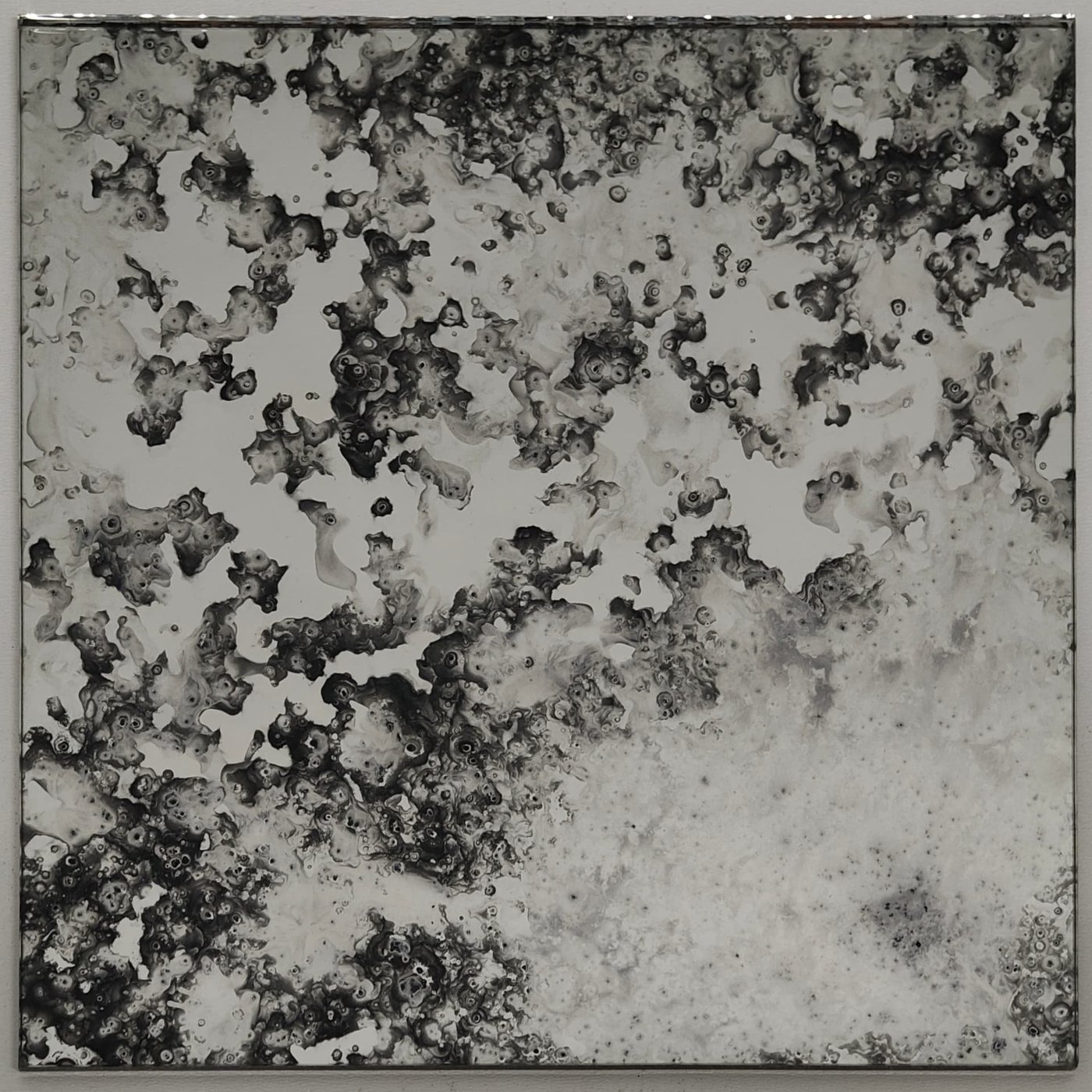 Mystique mirror panel with cloud-like dark antique veining