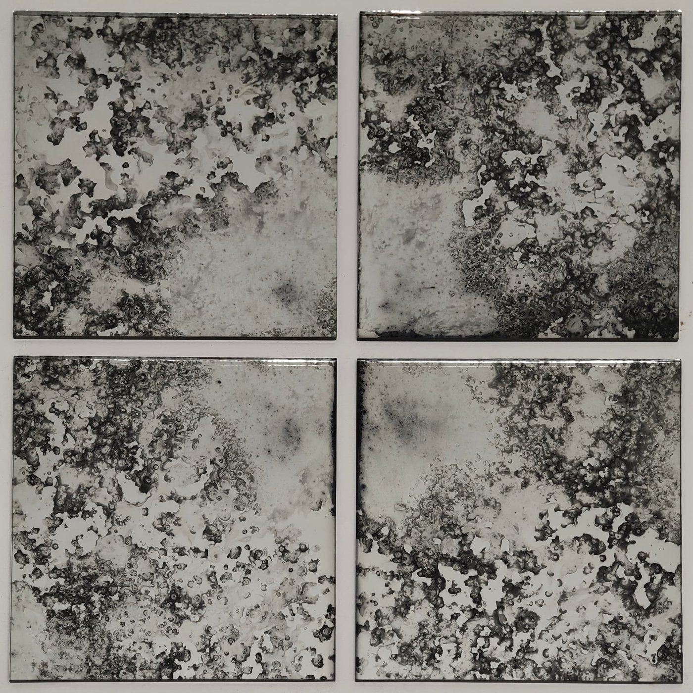 Mystique mirror shown as a four-panel tiled arrangement