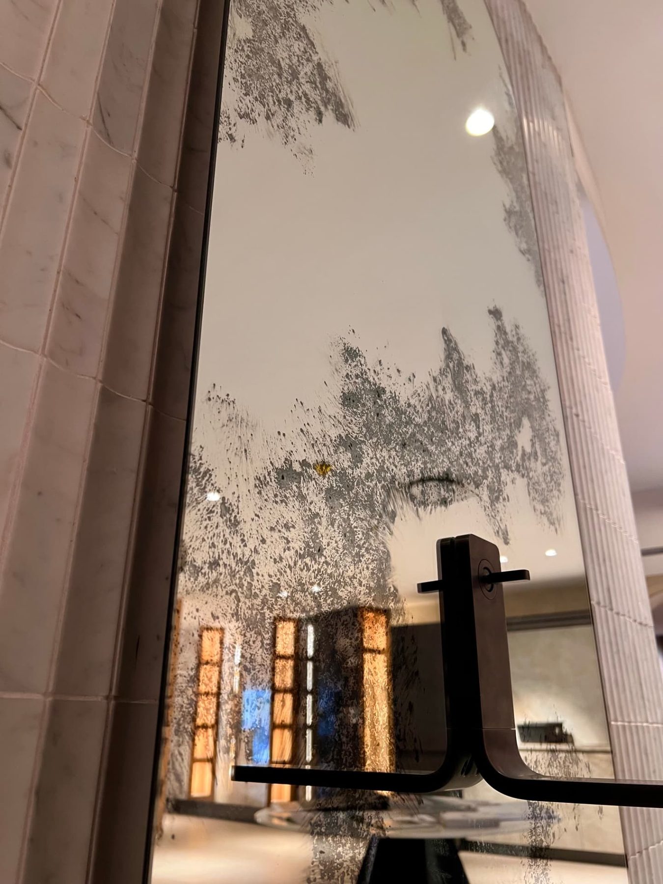 Noken display — Victorian mirror detail