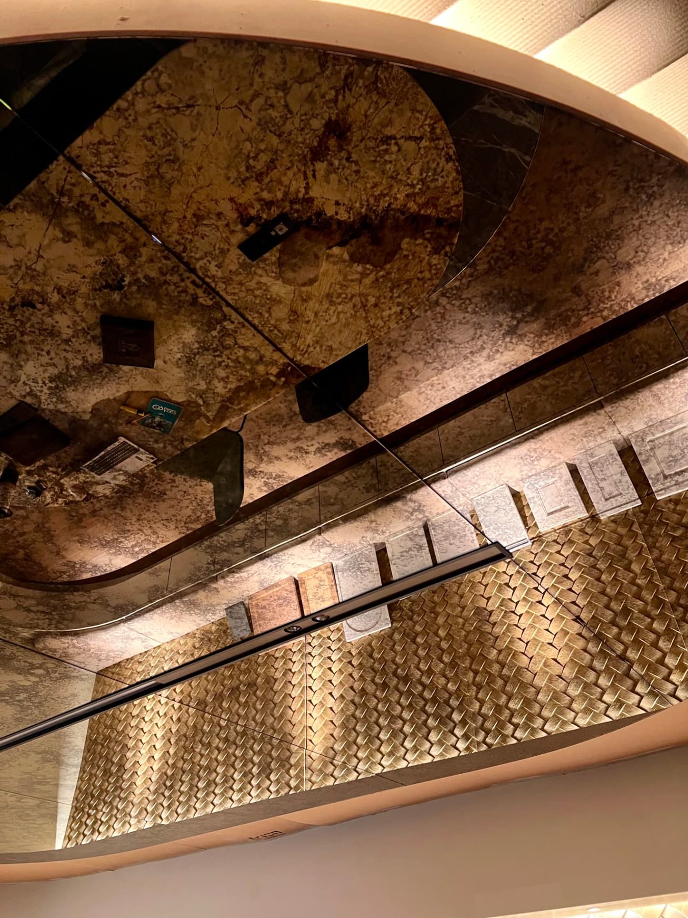 Boardroom — Mystique Bronze bulkhead detail